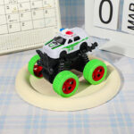 White police monster truck friction toy car with oversized green wheels and high suspension springs