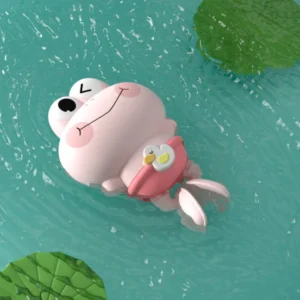 Krystal pink smiley frog wind-up bath toy floating in water for toddlers and kids