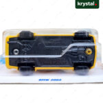 Underside of Hot Wheels BMW 2002 1:64 scale die-cast car showing Mattel manufacturing details and Made in Malaysia stamp