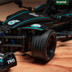 Technic Mercedes-AMG F1 W14 Building Block Model LEGO-compatible Technic Mercedes-AMG F1 W14 building block model showing wheel and aerodynamic front wing detail