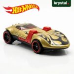 Gold Hot Wheels Twin Mill Braille Racer die-cast toy car with black flame decals and red wheels
