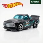 Hot Wheels Draftnator X-Raycers black die-cast toy car with blue translucent windows and teal graphics