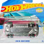 Hot Wheels VW ID. Buzz Bomb magenta and white die-cast electric van 1:64 scale with graffiti graphics
