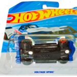 Hot Wheels Voltage Spike white and blue die-cast car in original packaging, HW EV Series mainline