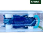 Blue Hot Wheels Wattzup die-cast car underside view showing Mattel branding, white wheels, and Malaysia origin