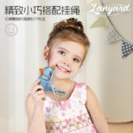 Child wearing a blue musical water bird whistle with lanyard, educational sensory toy for kids oral motor skills