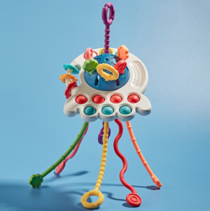 Krystal silicone sensory pull string activity toy with pop buttons and teething textures for baby motor skills.